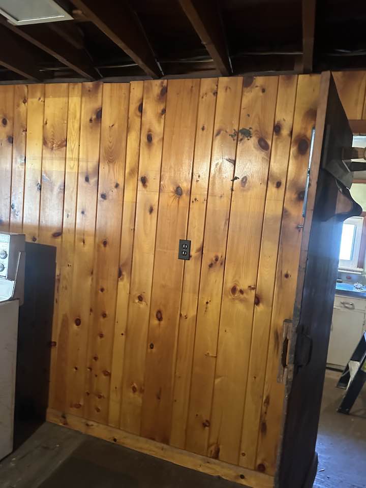 Interior door installation with modern hardware in a remodeled home.